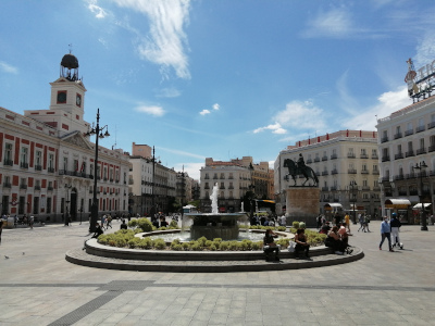 Puerta del Sol square in Madrid with the clock tower and Bear statue